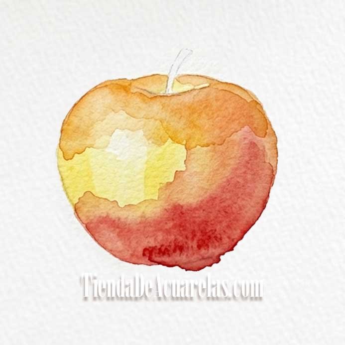 Proceso Manzana pintada por capas en acuarela. En este paso se añade dimensión aplicando tonos anaranjados y una primera base de rojo para construir el volumen de la manzana.